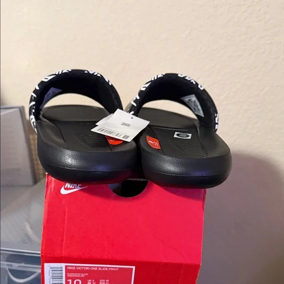 Nike Slide Sandals in Black with White Logo Print - Picture 6 of 7
